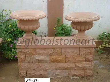 Twisted-Rim Sandstone Urns on Stone Wall (FP-31)