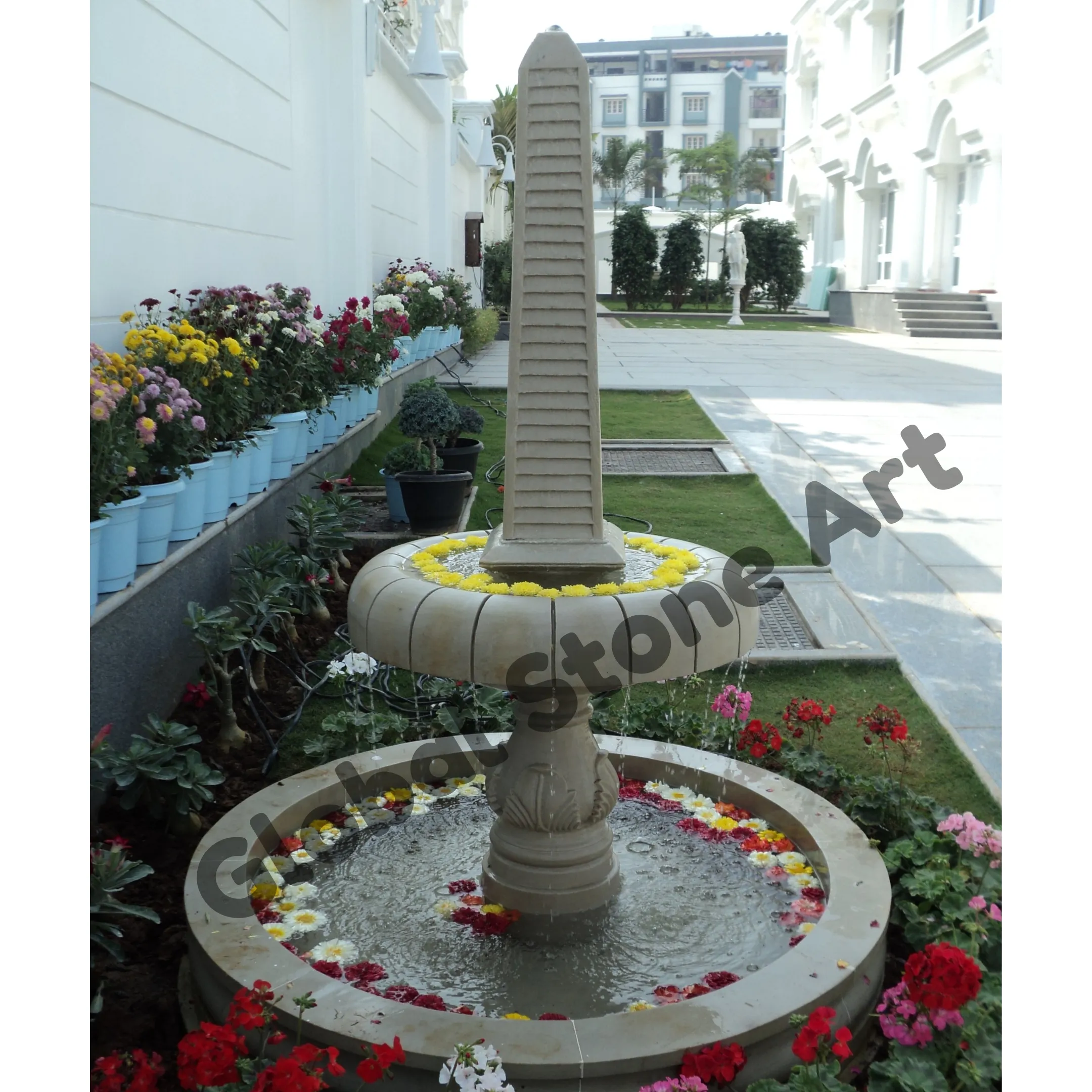 Carved Sandstone Obelisk Pillar Fountain in Round Bowl