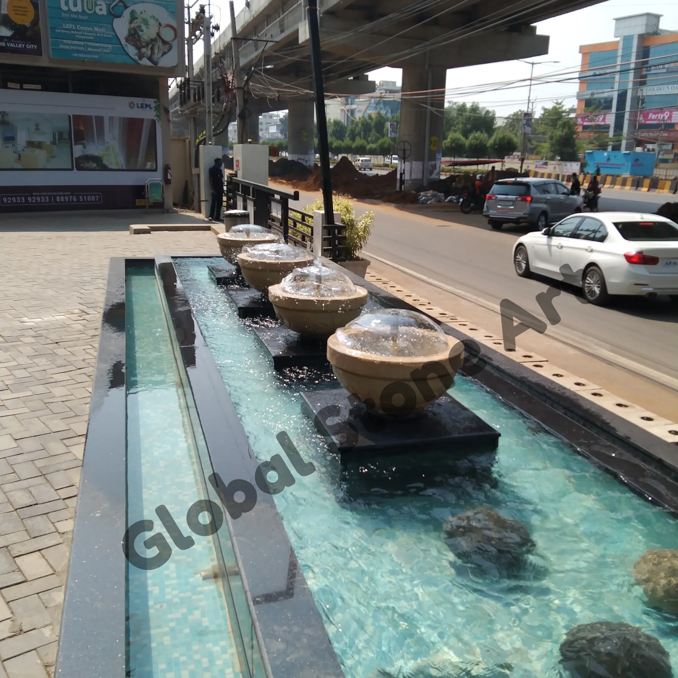 Carved Stone Bowl Cascade Fountain in Long Water Channel
