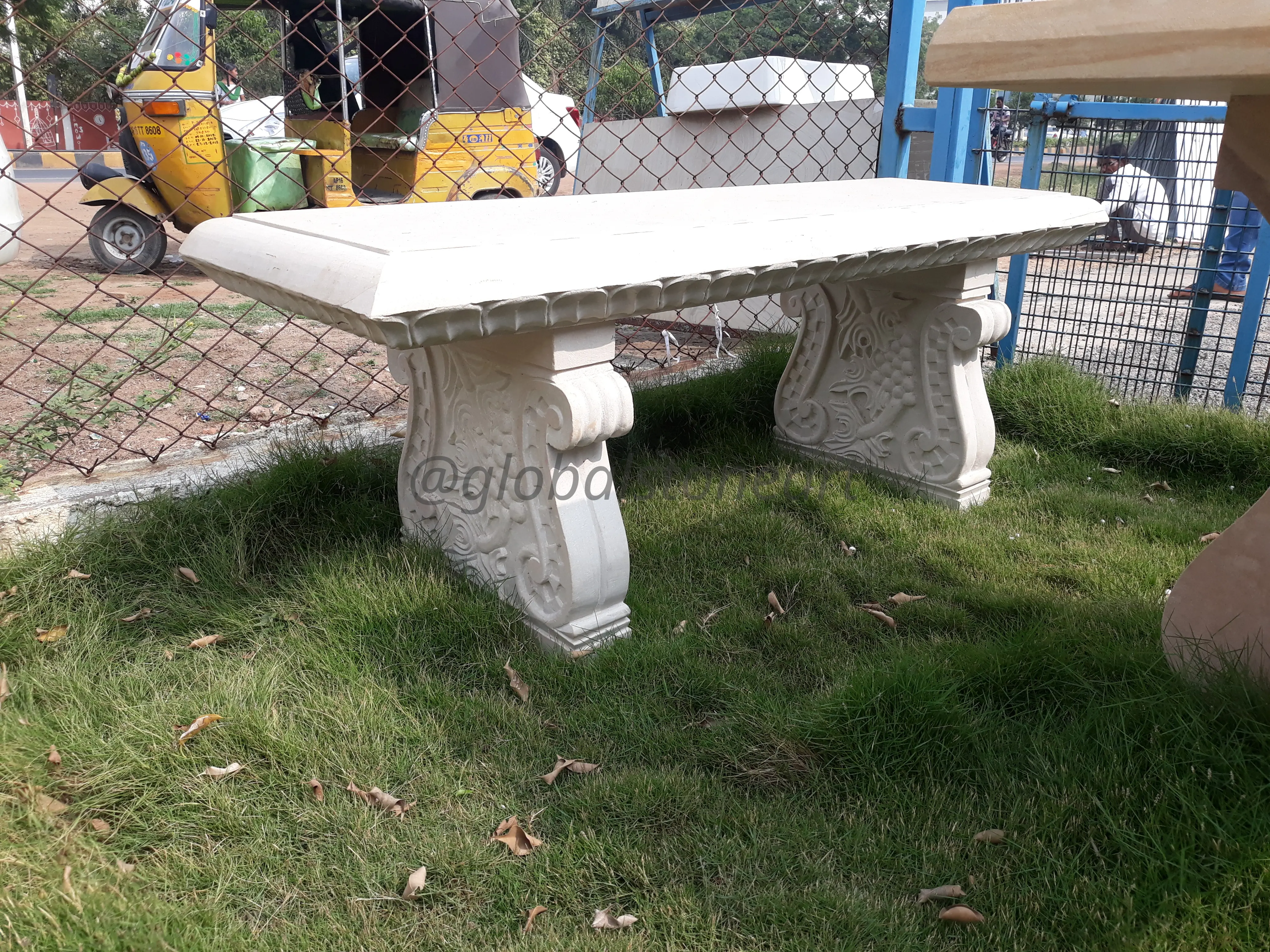 Carved Cream Stone Garden Bench with Scroll Legs