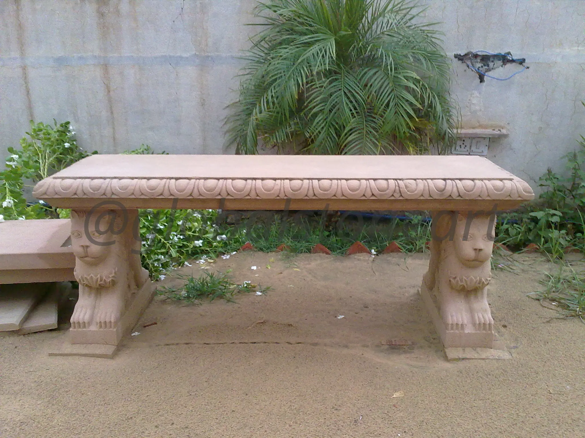 Pink Sandstone Bench with Carved Lion-Head Legs