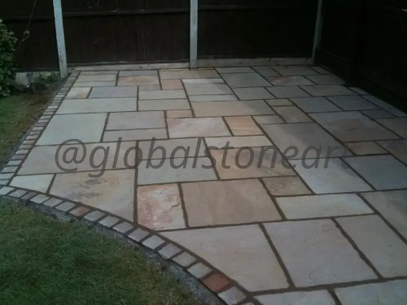 Sandstone Garden Paving with Cobble Setts Border