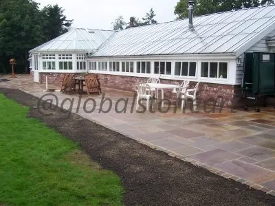 Rustic Sandstone Pathway Paving Beside Conservatory