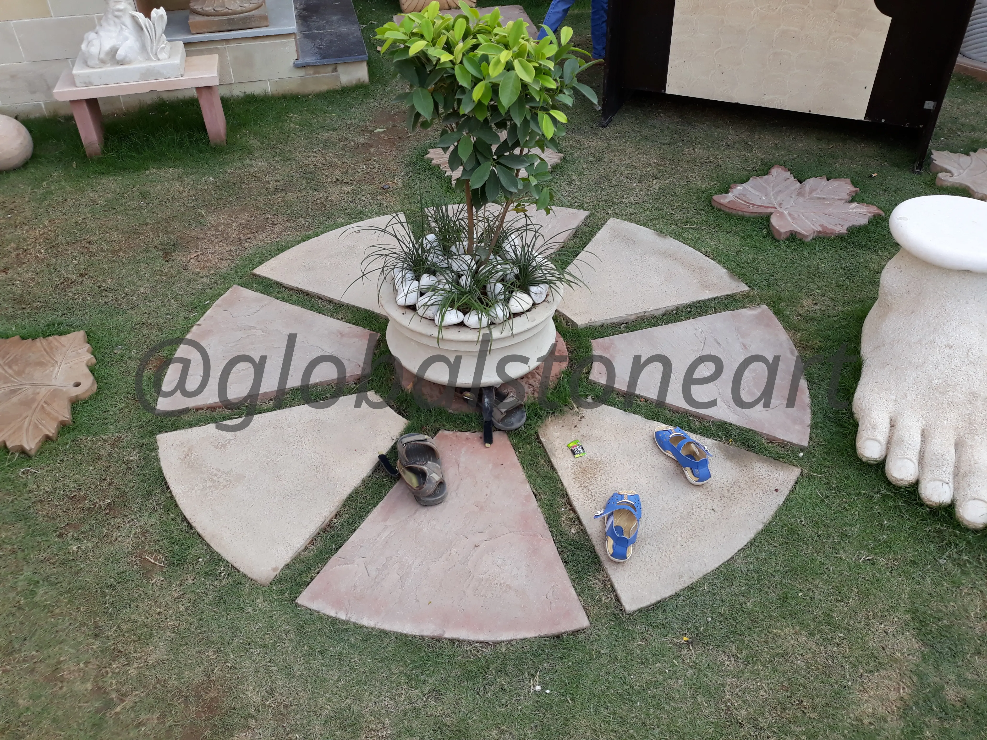 Sandstone Fan Stepping Stones Around Garden Planter