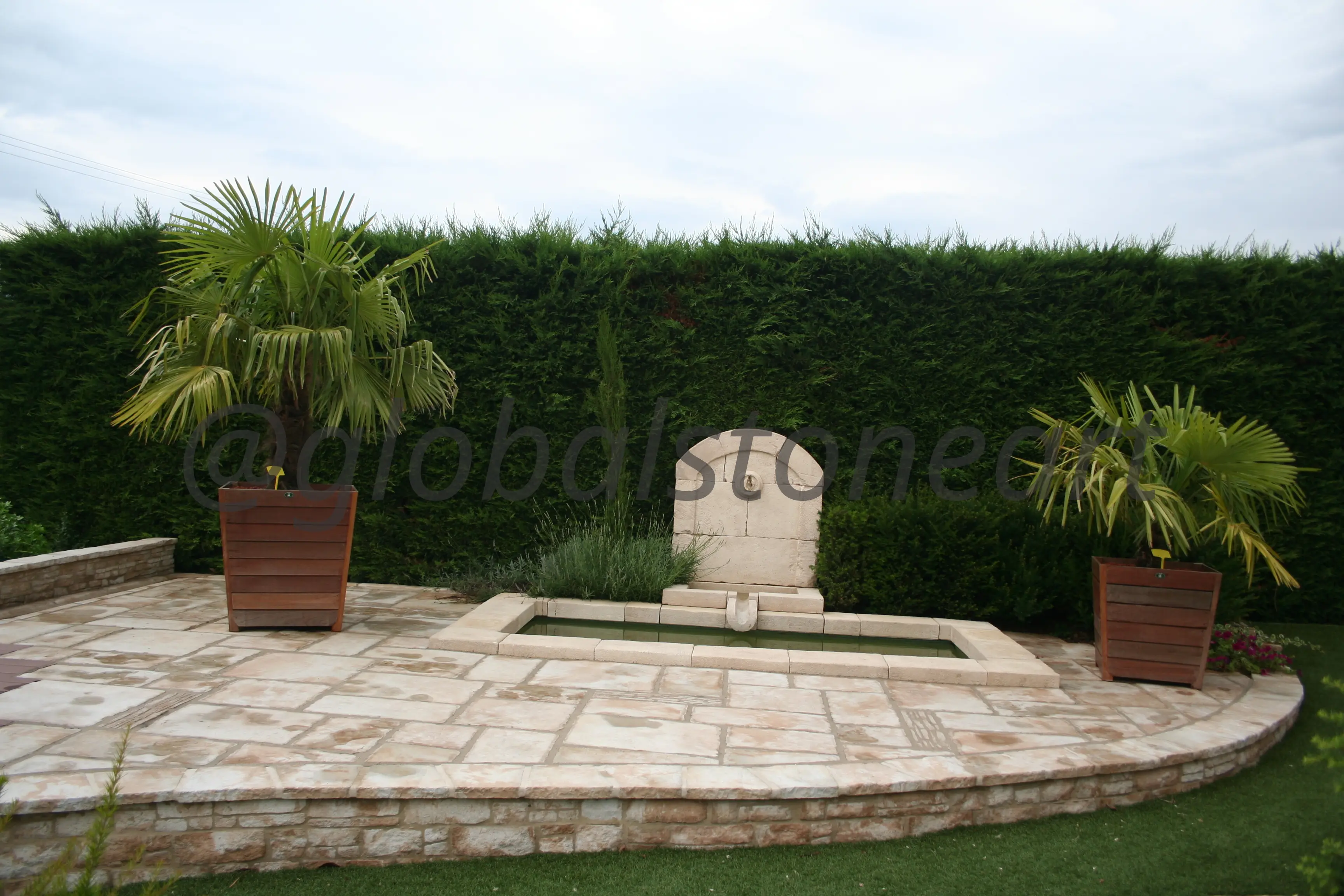 Buff Sandstone Patio with Wall Fountain and Water Channel