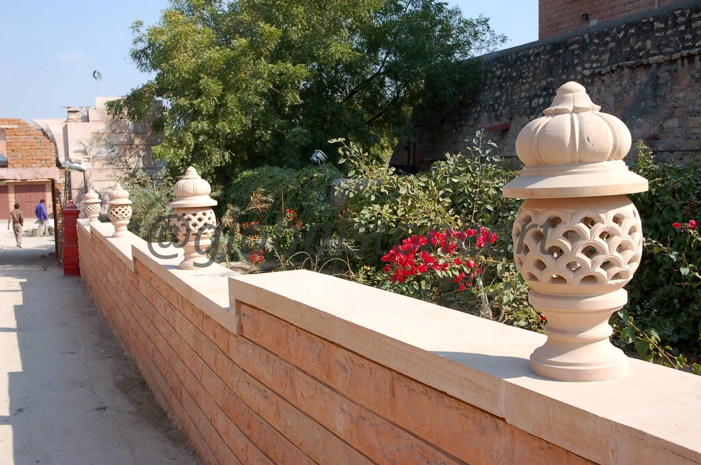 Cream Sandstone Lattice Globe Wall Lamps with Carved Finial