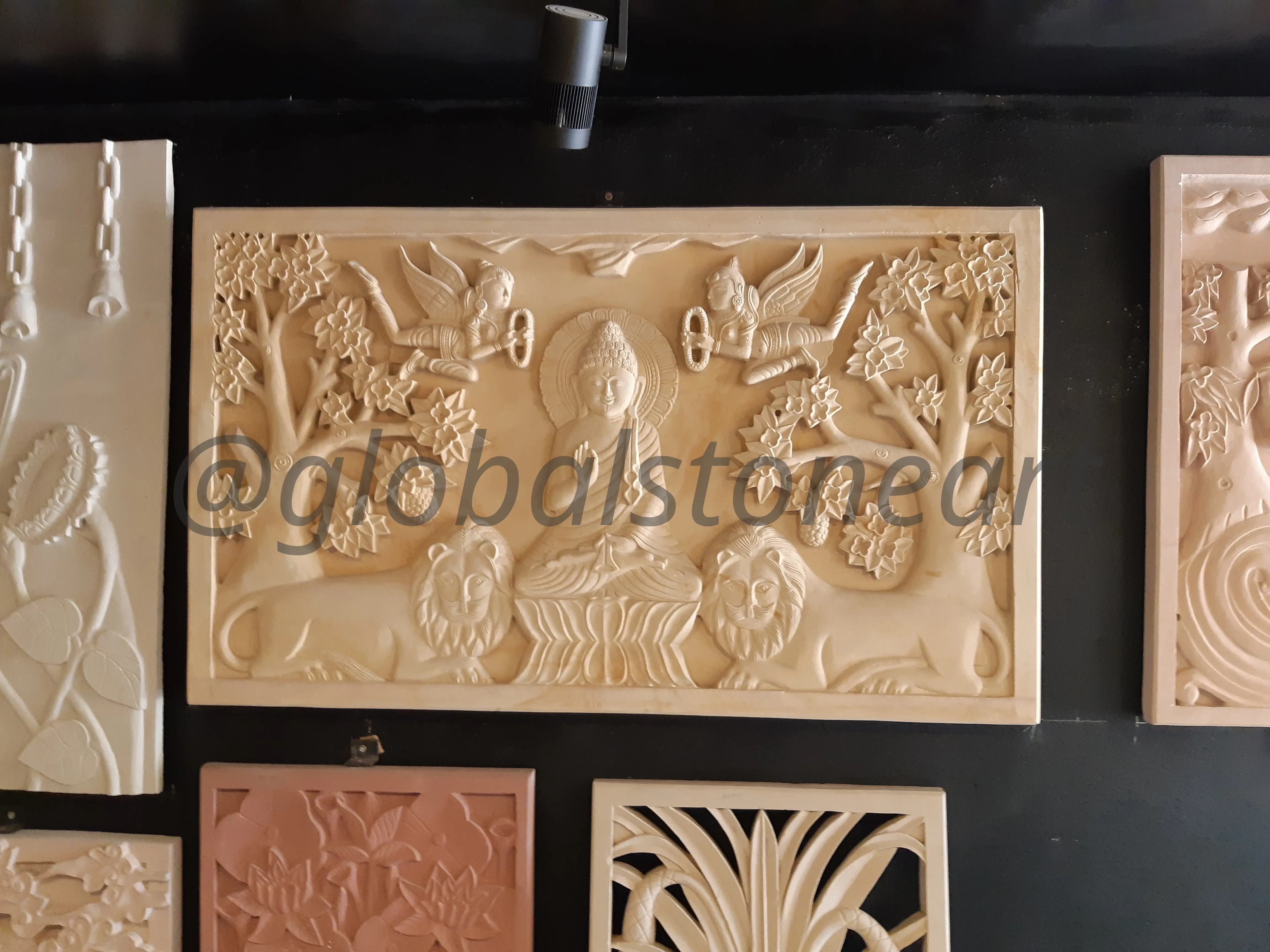 Carved Sandstone Deity Mural with Lions and Birds