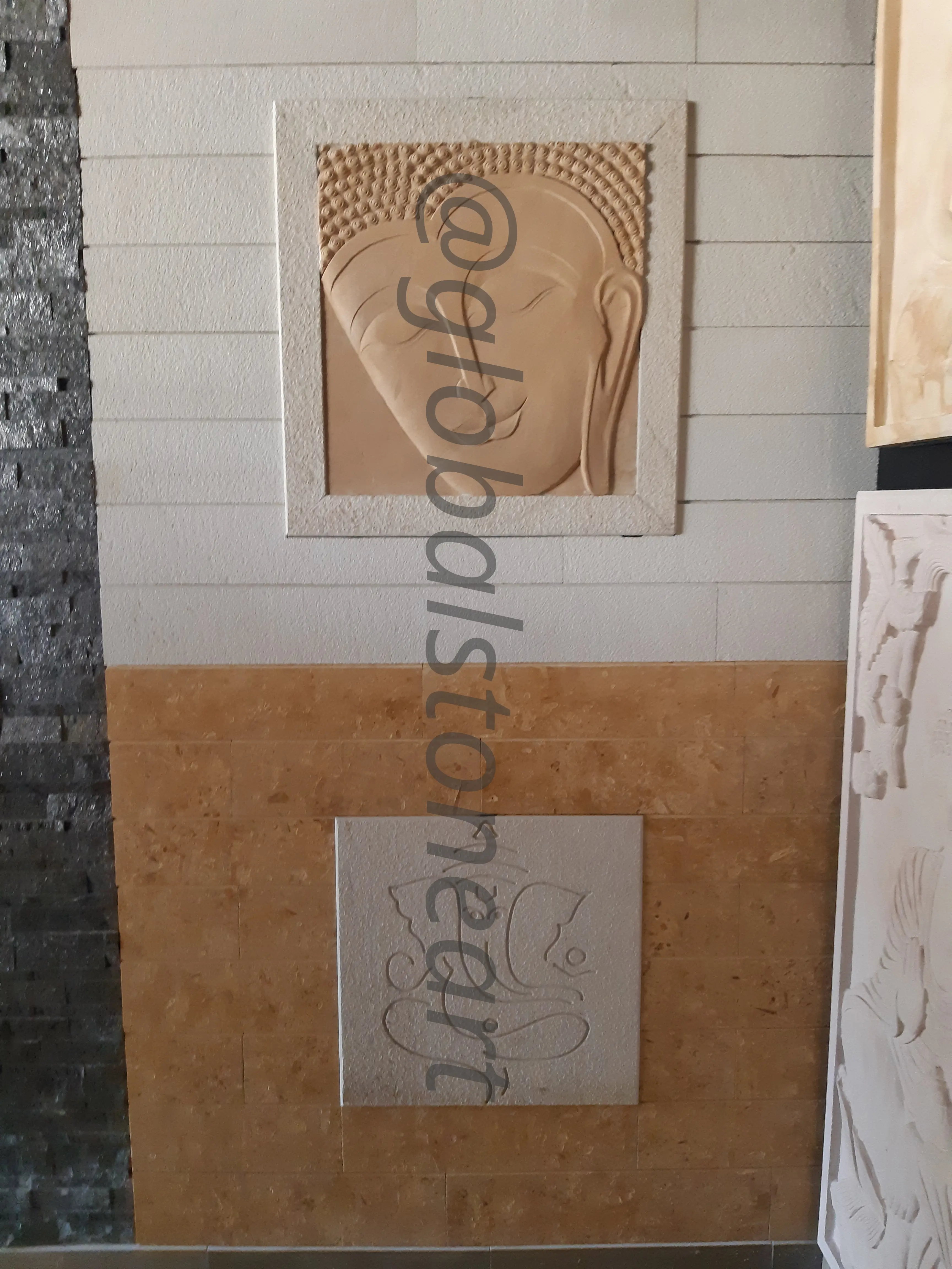 Buddha Face and Ganesha Sandstone Murals on Travertine Wall