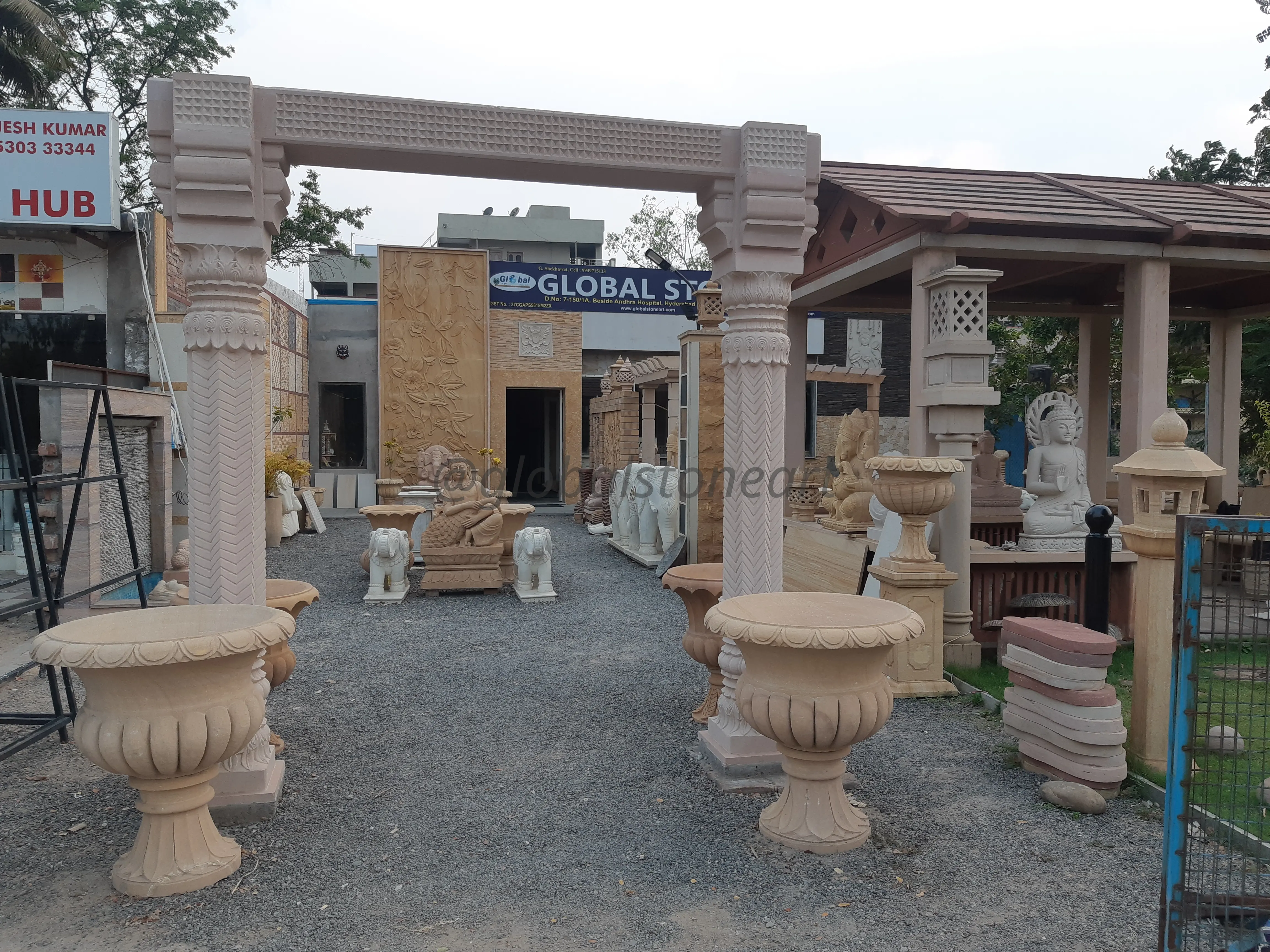 Carved Sandstone Torana Gateway Arch with Decorative Pillars