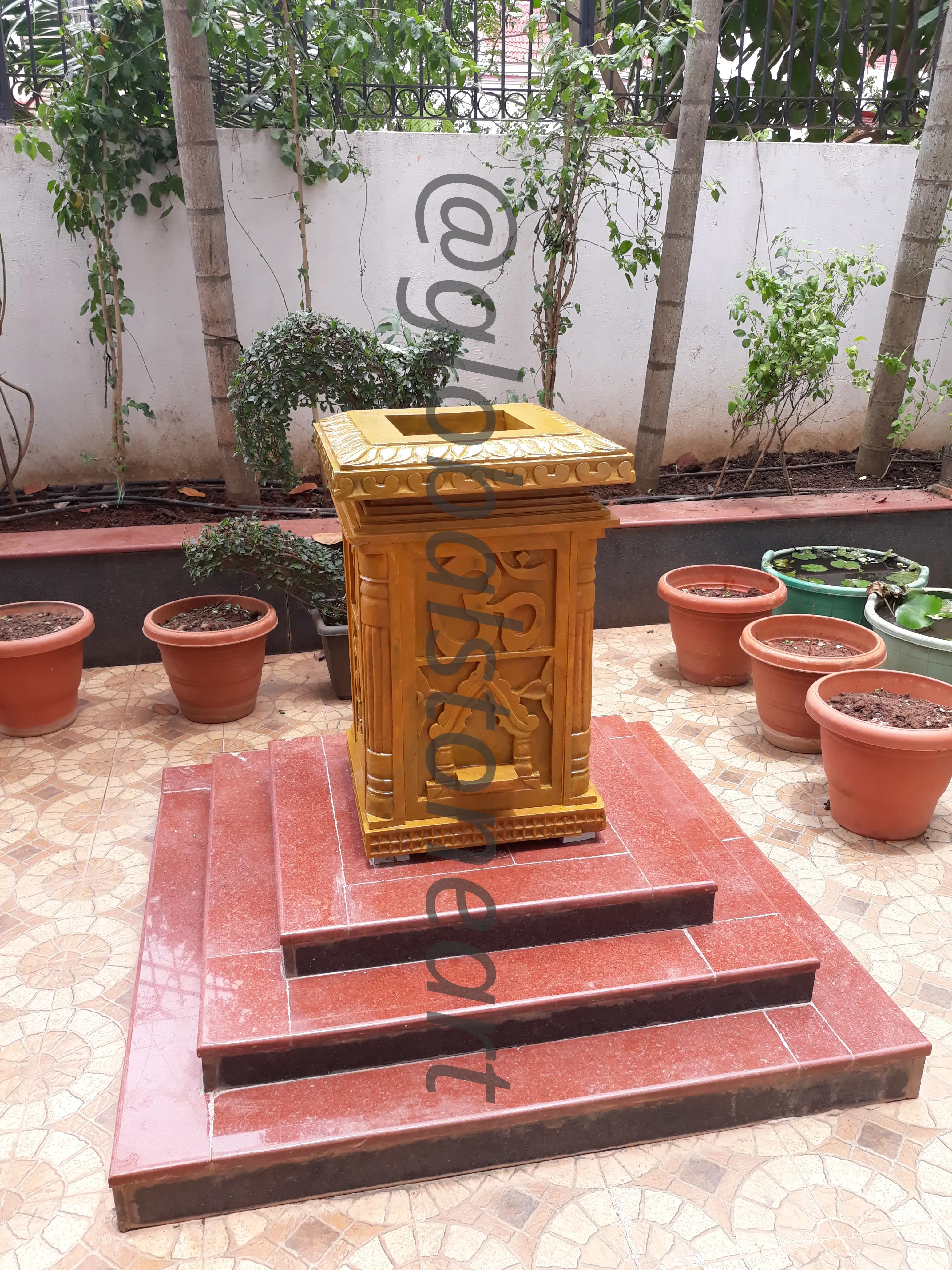 Ochre Sandstone Tulsi Pota with Jali Carving for Courtyard