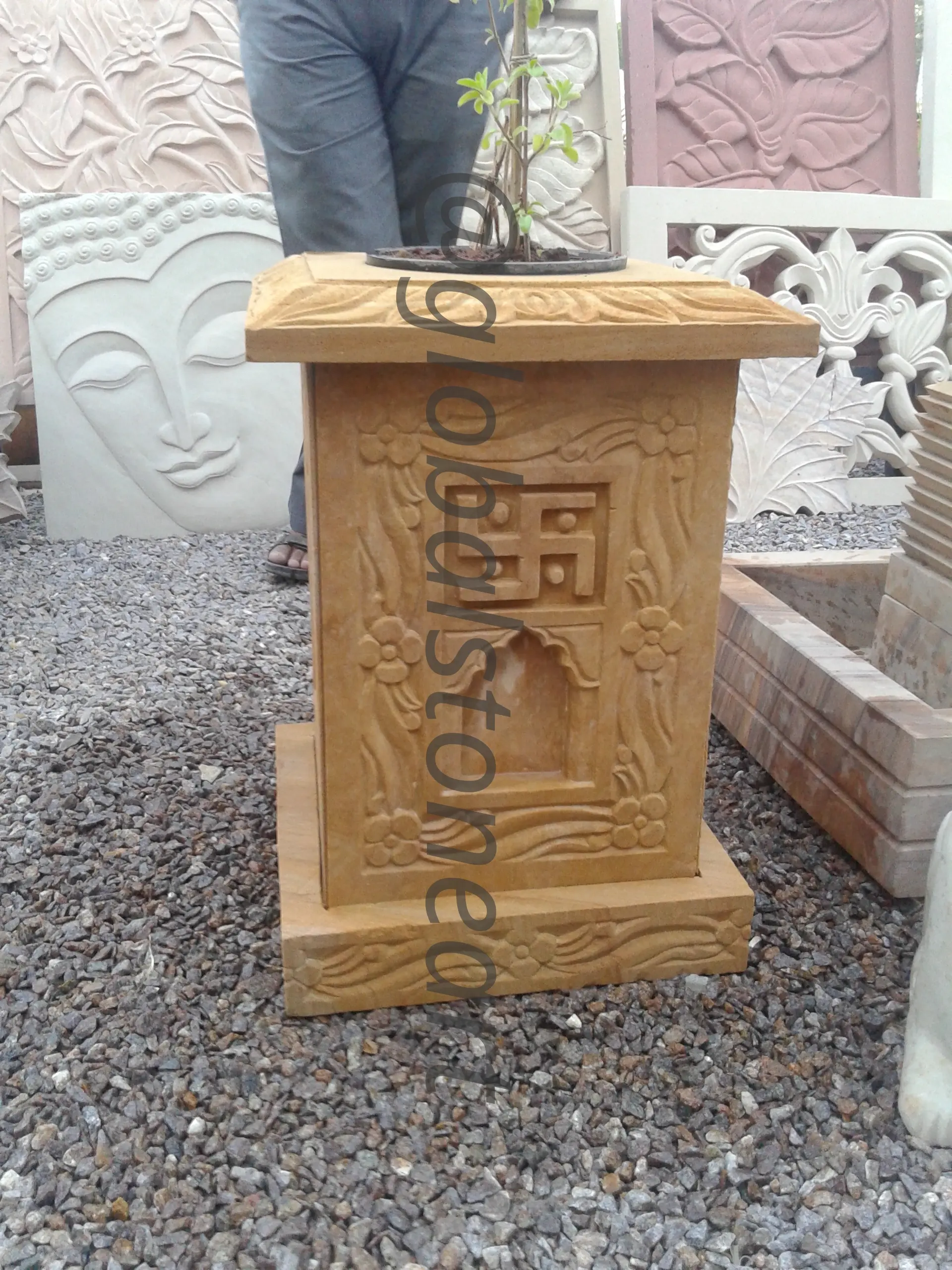 Yellow Sandstone Tulsi Pota with Floral & Swastika Carving