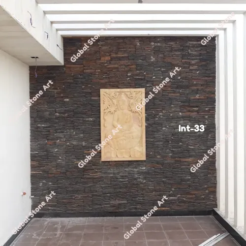 Dark Ledgestone Wall Cladding with Sandstone Insert Panel for Entrances