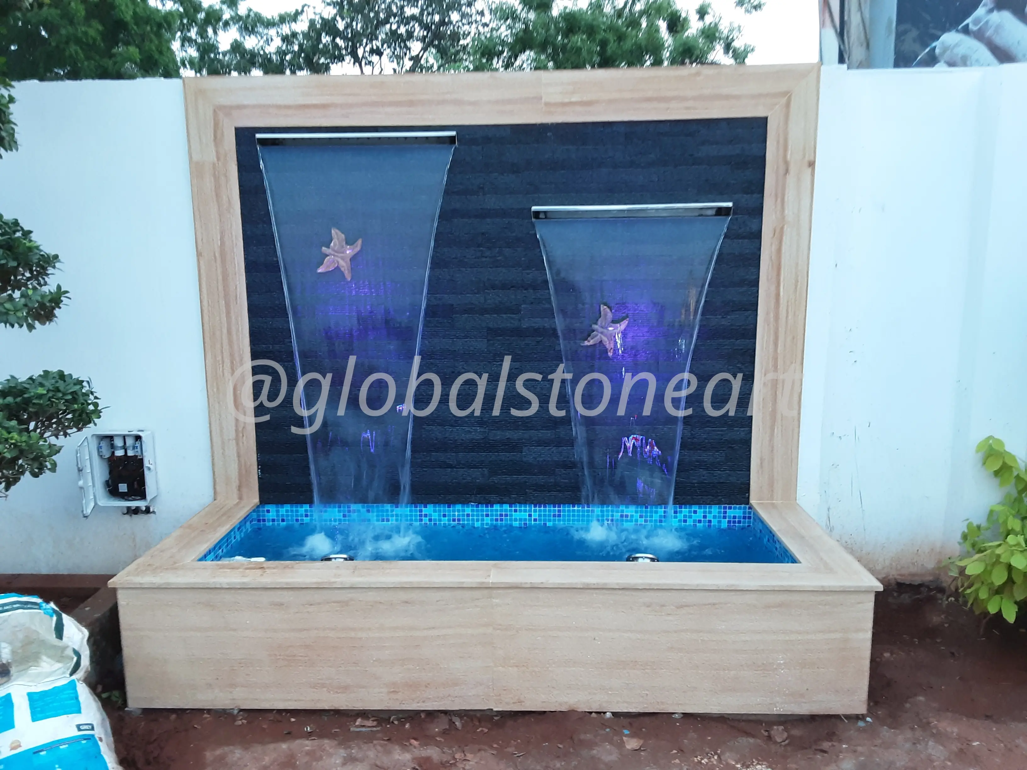 Twin Glass-Spout Waterfall with Star Motifs in Sandstone for Garden